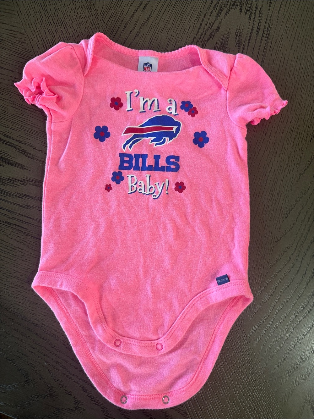 NFL Pink Buffalo Bills Baby onsie  size 6 to 12 months. New but without tags
